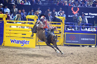 NFR  RD TWO (859) Bareback Riding Dean Thompson All Eyes on A&K Power River Rodeo