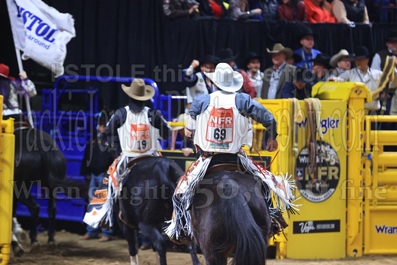 NFR RD Five (849) Bareback Clayton Biglow, on Pickett Pro Rodeo Co 's Night Crawler, and Jayco Roper, on C5 Rodeo's Virgil, 89.5 points