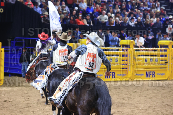 NFR RD Five (840) Bareback Clayton Biglow, on Pickett Pro Rodeo Co 's Night Crawler, and Jayco Roper, on C5 Rodeo's Virgil, 89.5 points