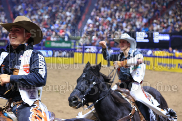 NFR RD Five (827) Bareback Clayton Biglow, on Pickett Pro Rodeo Co 's Night Crawler, and Jayco Roper, on C5 Rodeo's Virgil, 89.5 points