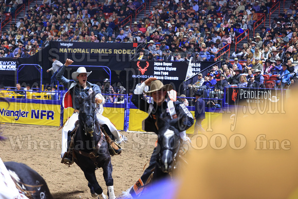 NFR RD Five (822) Bareback Clayton Biglow, on Pickett Pro Rodeo Co 's Night Crawler, and Jayco Roper, on C5 Rodeo's Virgil, 89.5 points