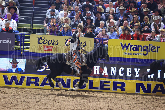 NFR RD Five (804) Bareback Clayton Biglow, on Pickett Pro Rodeo Co 's Night Crawler, and Jayco Roper, on C5 Rodeo's Virgil, 89.5 points