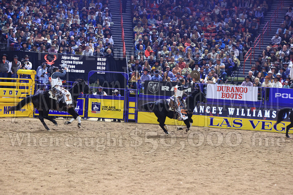 NFR RD Five (800) Bareback Clayton Biglow, on Pickett Pro Rodeo Co 's Night Crawler, and Jayco Roper, on C5 Rodeo's Virgil, 89.5 points