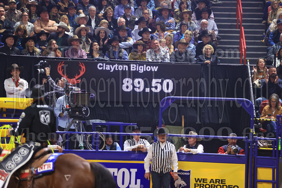 NFR RD Five (710) Bareback Clayton Biglow, on Pickett Pro Rodeo Co 's Night Crawler