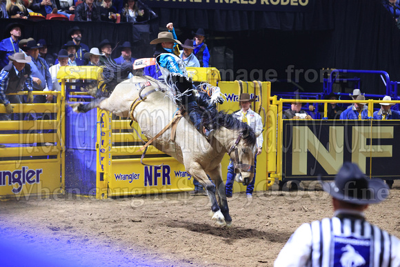 NFR 23 Round Three (802) Bareback Riding Clayton Biglow Top Dollar Andrews Rodeo