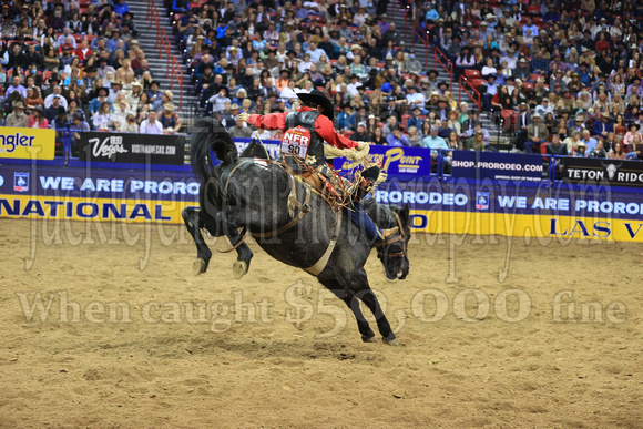 NFR RD ONE (3194) Saddle Bronc, Kolby Wanchuk, Spotted Blues, Big Bend